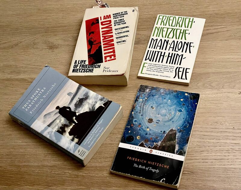 Bjorn's Nietzsche book collection — I Am Dynamite, Man Alone With Himself, Thus Spoke Zarathustra, The Birth of Tragedy